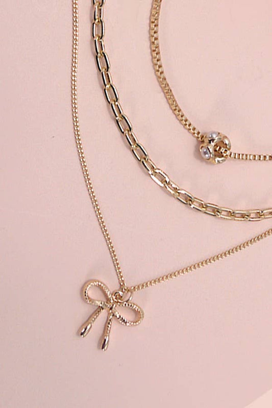 MULTI LAYER PEARL BOW CAHRMNECKLACE