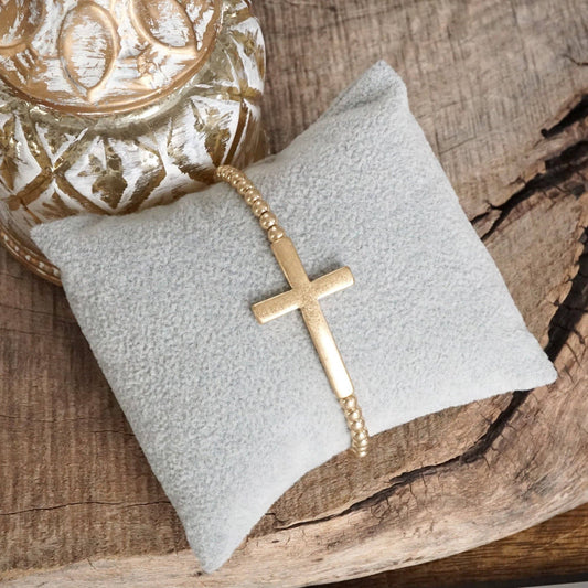 Cross Stretchy Bracelet in Worn Gold tone