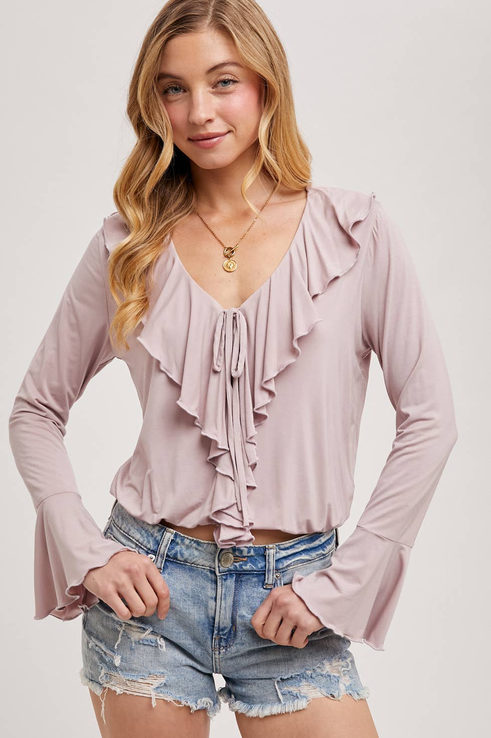 RUFFLED NECK JERSEY BLOUSE