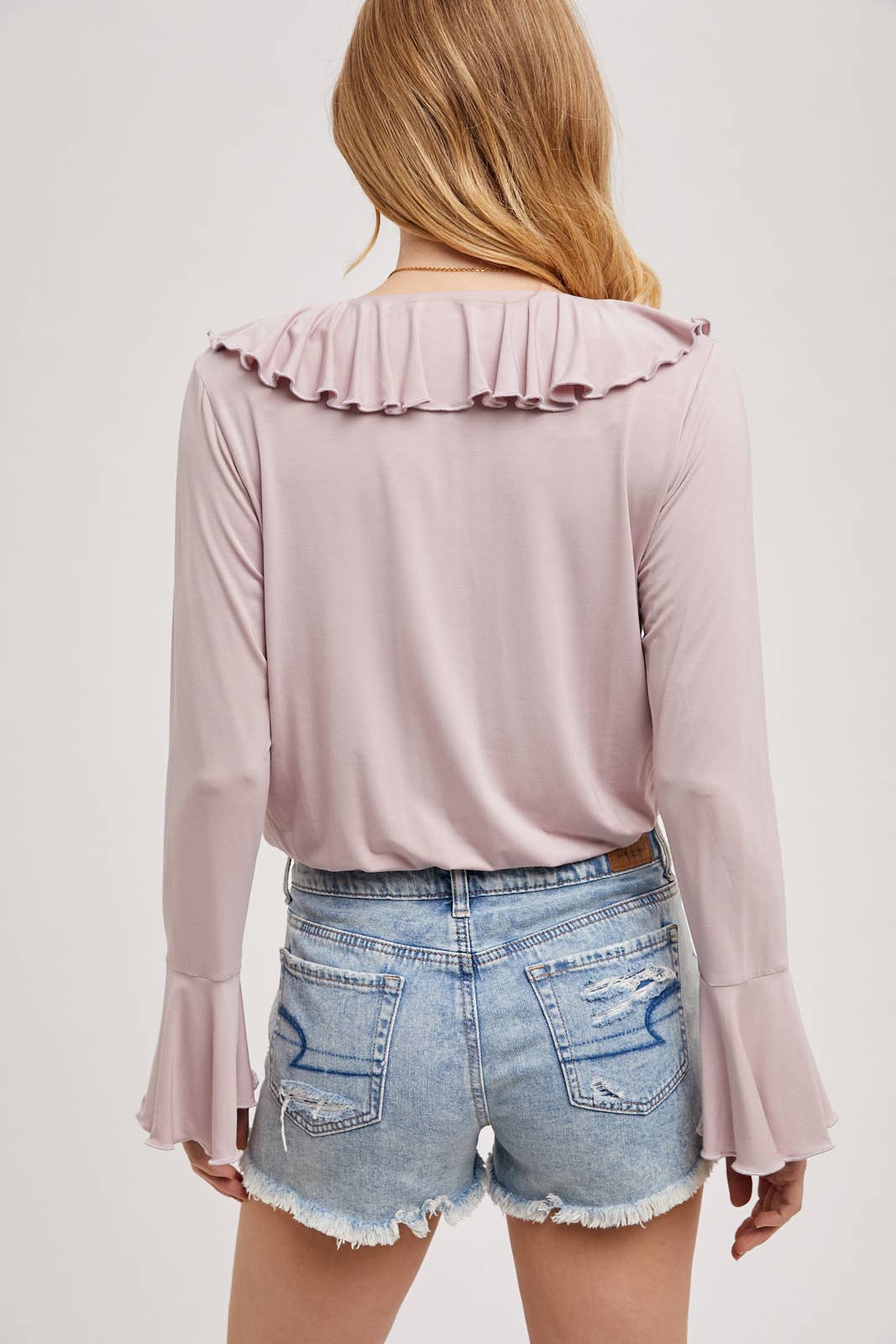 RUFFLED NECK JERSEY BLOUSE